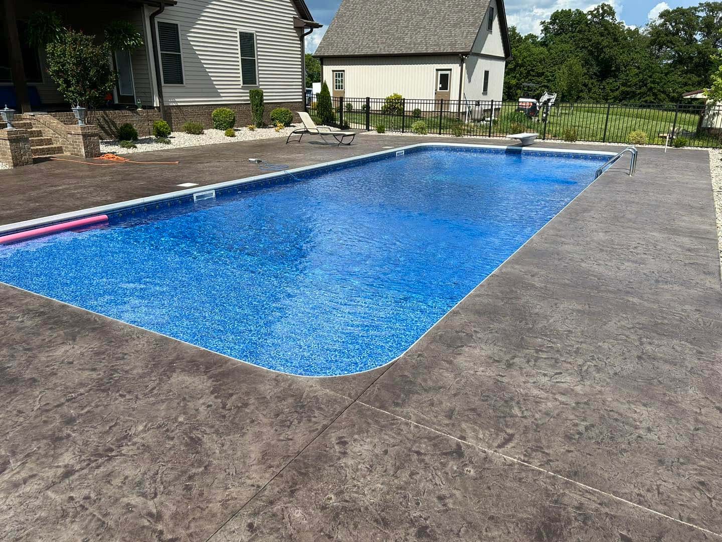 Concrete pool deck installed by Four Rivers in Western Kentucky